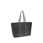 The Rockstud Tote Bag by Valentino Garavani in black calfskin with studded straps and a sleek design.
