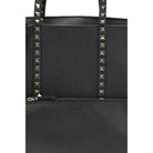 The Rockstud Tote Bag by Valentino Garavani in black calfskin with studded straps and a sleek design.